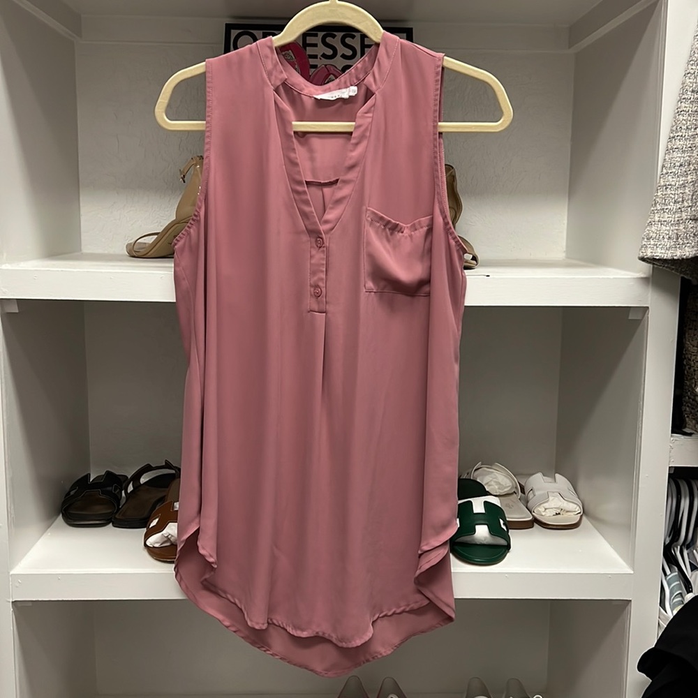 Lush sleeveless blouse tunic. Perfect for under a second layer for the office!